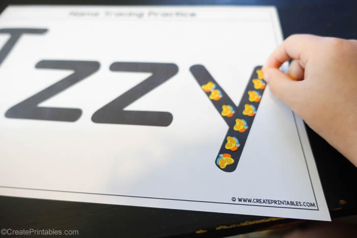 name tracing worksheet with stickers